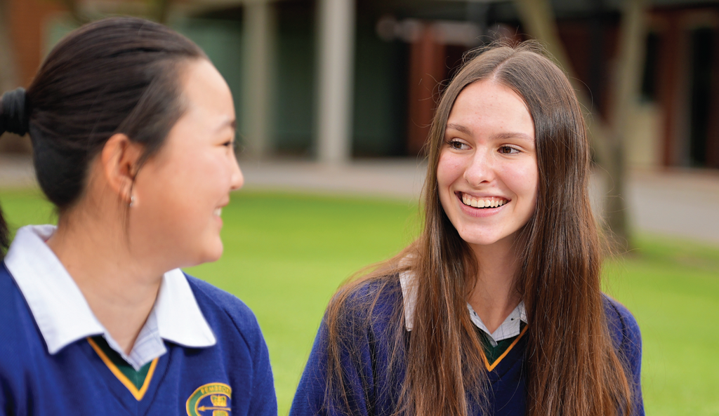 Senior student talking outside