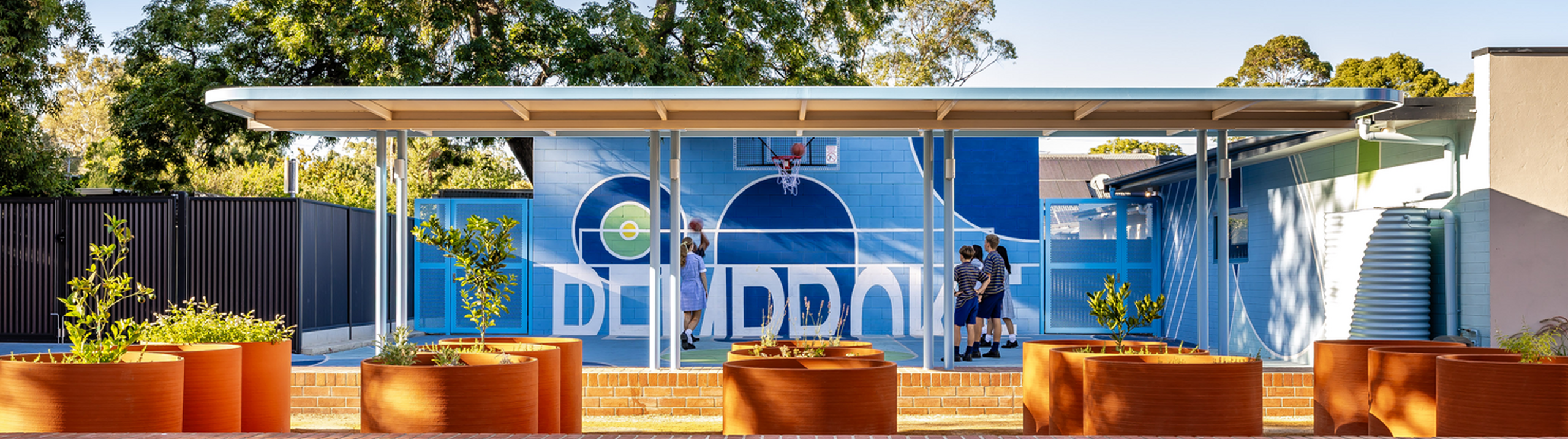 Middle school students on kings campus outdoor court