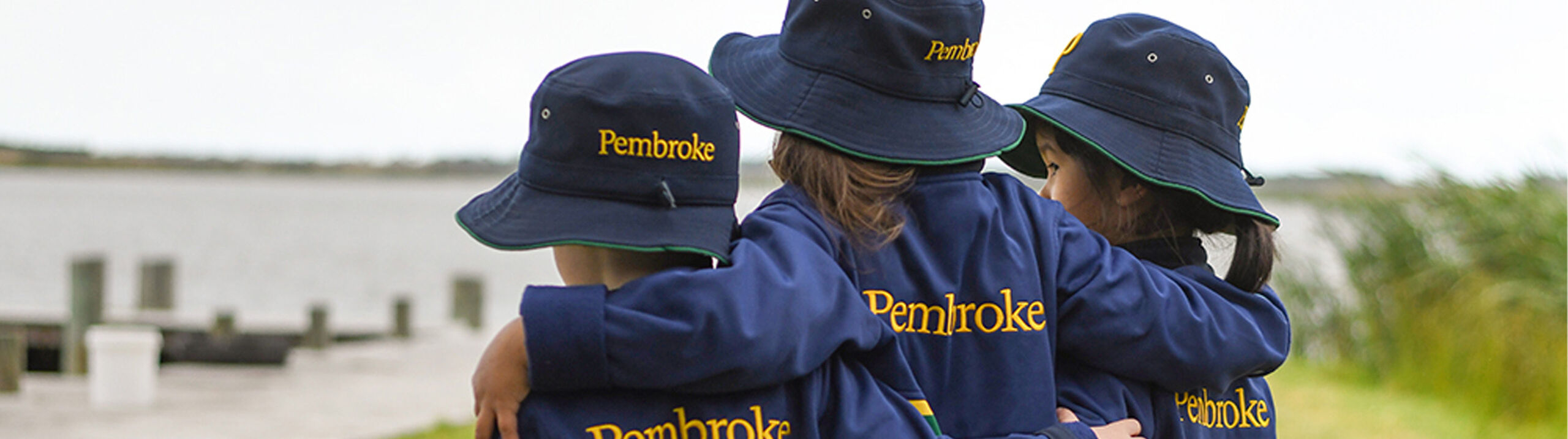 Three ELC students overlooking Finniss River at Old Watulunga cropped