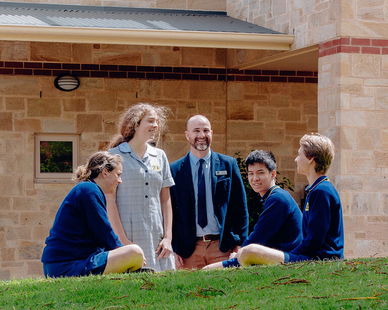 Teacher and students on the Girton Campus