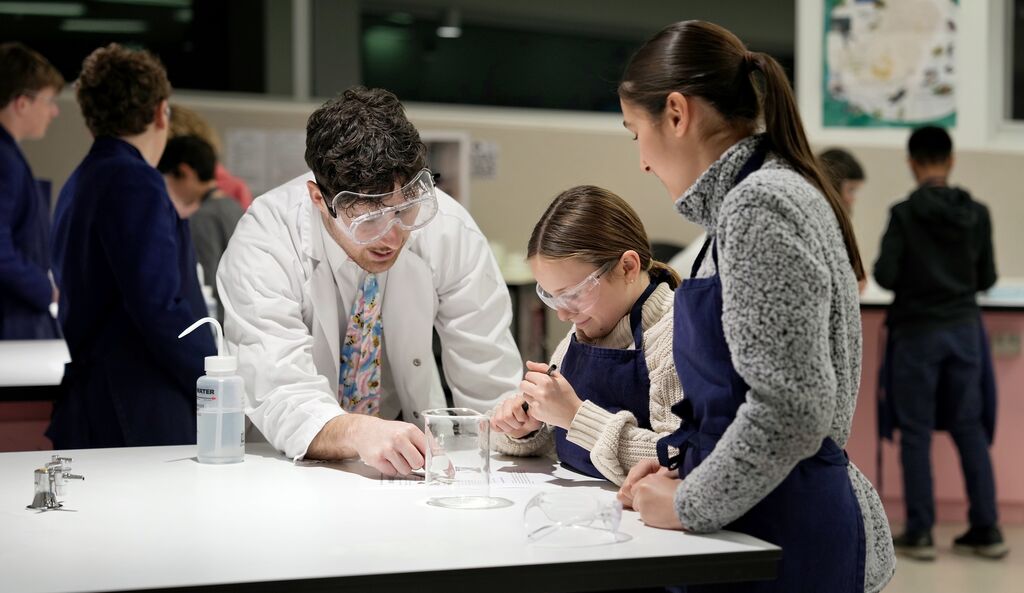 Year 7 student with science teacher