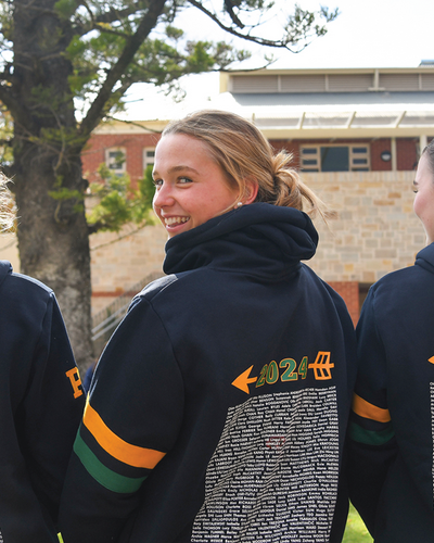 Female senior students in class sweatshirts