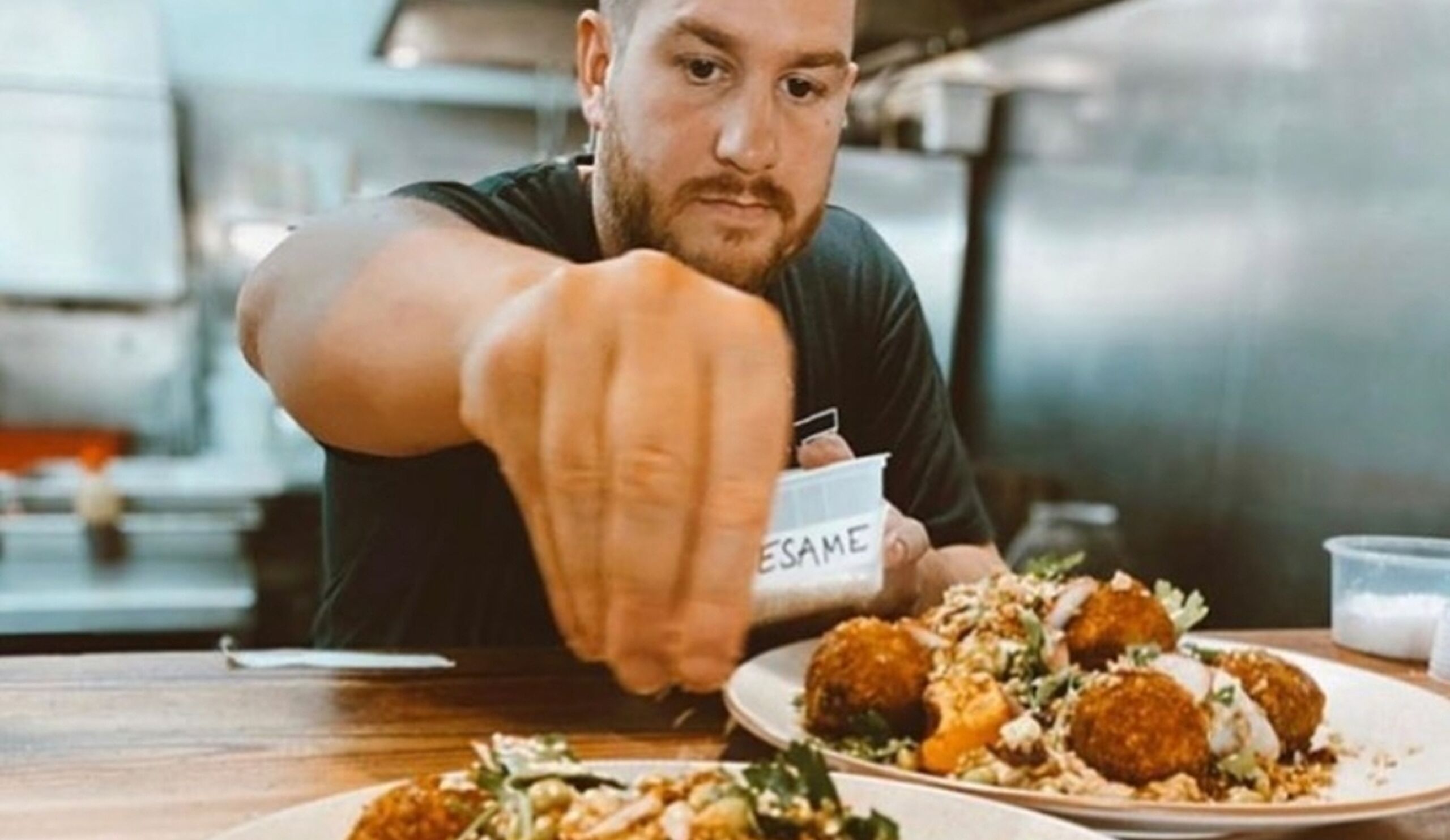 Sam Worrall-Thompson plating up for Kitchen Catering by Sam